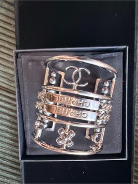 CHANEL Gold-Tone Multi-Row Logo Cuff Bracelet